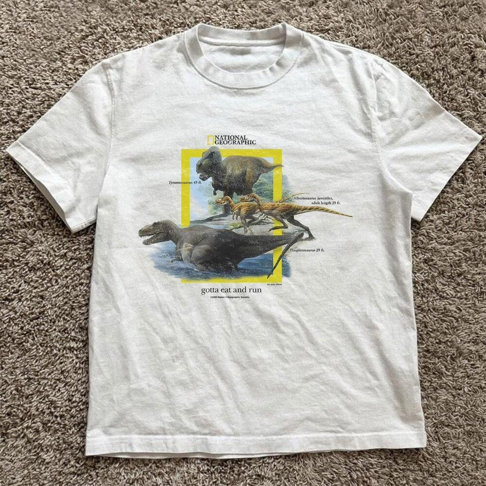 White 1990S National Geographic Dinosaurs Gotta Eat And Run Tee